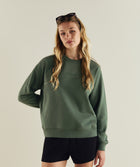 Woman wearing FOM ladies textured crew neck sweat in sage green