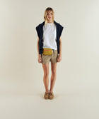 Woman wearing FOM ladies regular tee in white