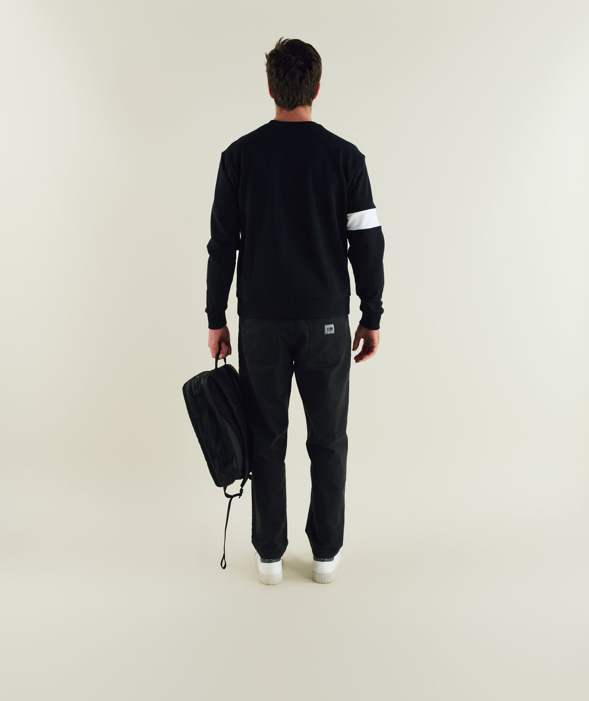 FOM x Kolisi captains sweater in black, on-model view